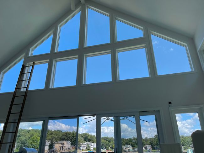 Wall of windows on the lake side | Image 13