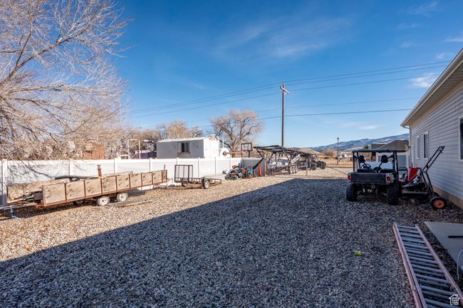 View of yard featuring fence | Image 60