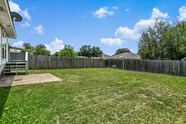 View of yard with a patio area | Image 24