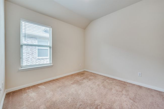 Bedroom with light carpet, and baseboards | Image 21
