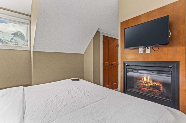 402 - 191 Kananaskis Way, Condo with 3 bedrooms, 3 bathrooms and 1 parking in Canmore AB | Image 25
