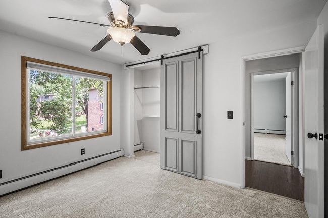 This bedroom offers versatile space, ideal as a guest room, or a flexible room to suit your needs. | Image 21