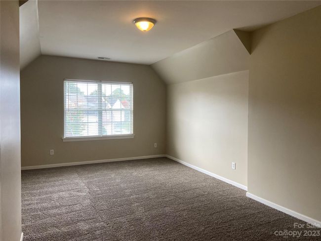 Bed/bonus room with walk in closet | Image 21