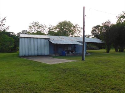 View of shed / structure featuring a yard | Image 3