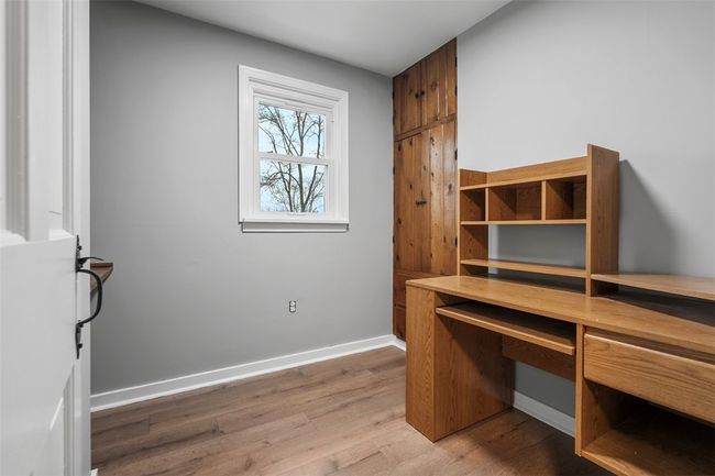 Used as a den, this space would make a great nursery or office. | Image 25