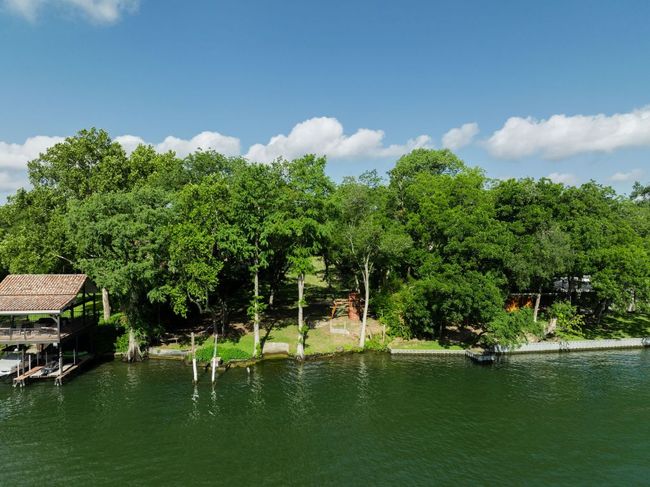 Water view featuring boat lift and a boat dock | Image 10