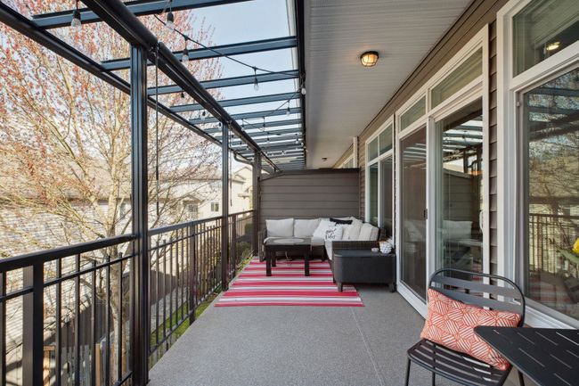 Exterior space with an outdoor living space and a balcony | Image 27