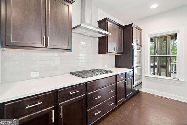 4180 Woodwind Dr, House other with 6 bedrooms, 5 bathrooms and 3 parking in Cumming GA | Image 11