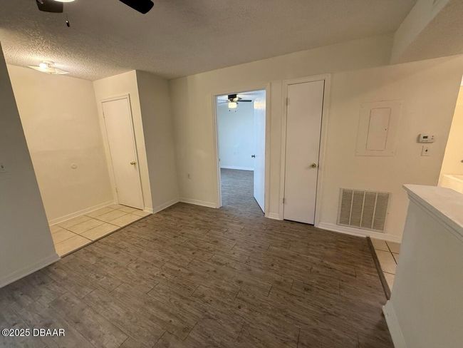 living and shot of entry to the bedroom with jack and Jill bathroom | Image 52