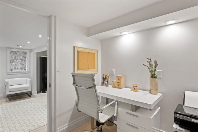 Office space featuring recessed lighting and light wood-style flooring | Image 24