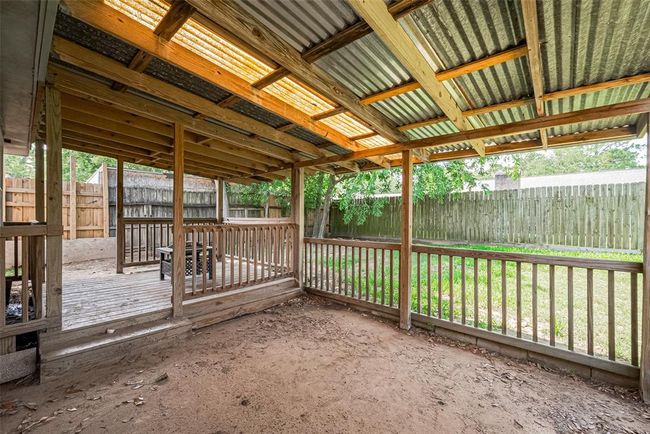 Enjoy entertaining guests outside with large covered patio. | Image 20