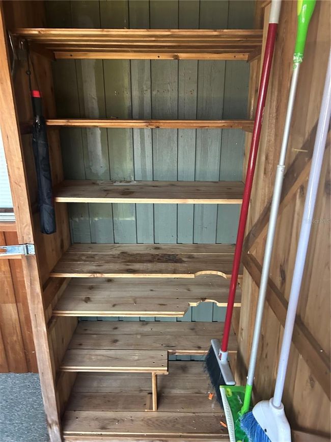 Storage closet on screened in porch | Image 25