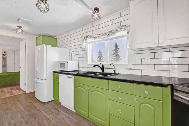 119 Clark Cres, Home with 3 bedrooms, 2 bathrooms and 2 parking in County Of Grande Prairie No. 1 AB | Image 6