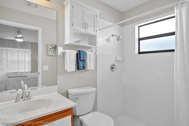 bathroom w/walk in shower and large linen closet | Image 16
