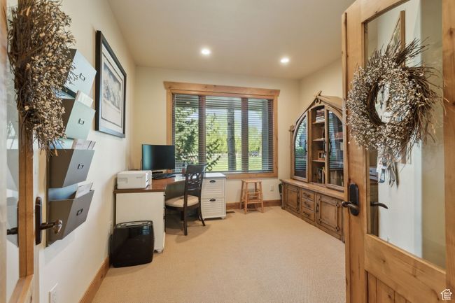 Home office with light colored carpet, baseboards, recessed lighting, and french doors | Image 19