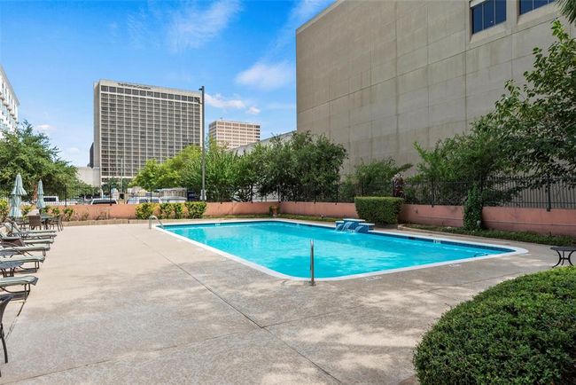 Relax by the pool and enjoy all of the amenities at The Oxford. | Image 7
