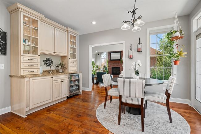 Eat-In Kitchen area with wet bar and beverage fridge | Image 9