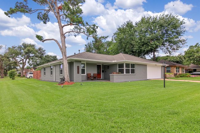 This home has mature trees, spacious corner lot, and everything you need to have piece of mind for years to come. | Image 29