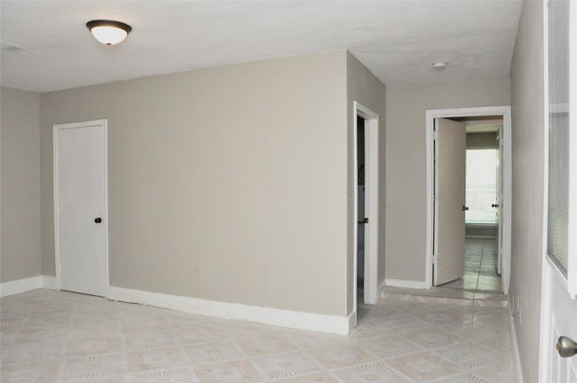 Bonus room with light tile patterned floors, visible vents, and baseboards | Image 23