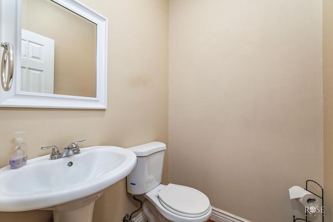 half bath off the kitchen & utility room | Image 39