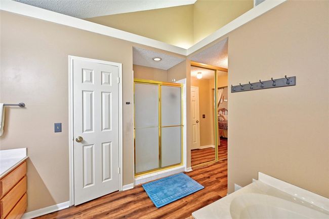 Luxurious bathroom featuring a separate soaking tub and shower for ultimate relaxation. | Image 23