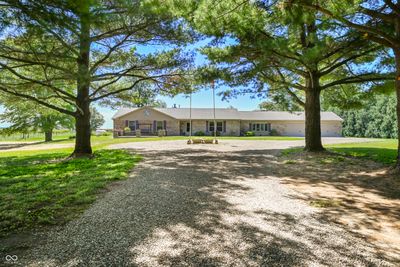 Welcome home! 4 bed 3 full bath all brick ranch home nestled on 2.59 acres | Image 1