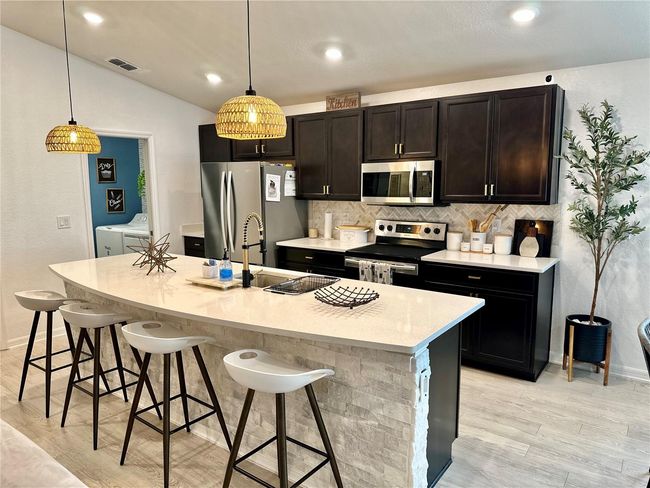 Kitchen with island | Image 13