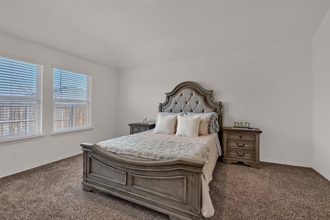 Bedroom featuring carpet floors and baseboards | Image 17