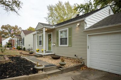 View of front of property featuring a garage | Image 3