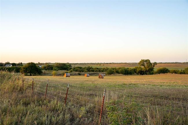 Yard at dusk with a rural view | Image 15