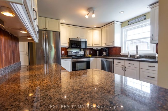 1467 Wade Rd, Home with 4 bedrooms, 2 bathrooms and 18 parking in Russell ON | Image 16