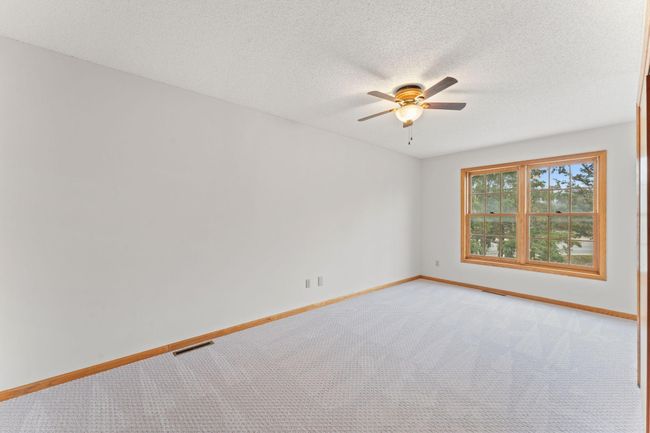 Upper level bedroom 2 with attached bathroom | Image 11