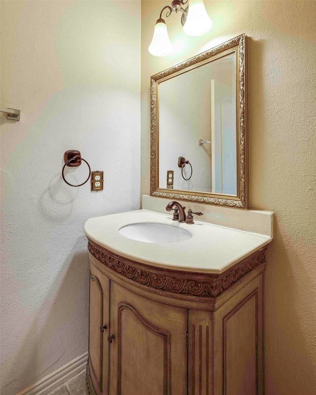 Bathroom featuring vanity | Image 11
