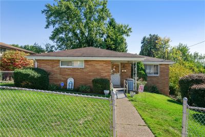 Level entry 3 bedroom brick ranch. | Image 1