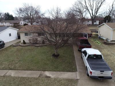 View of front of house featuring a front lawn | Image 1