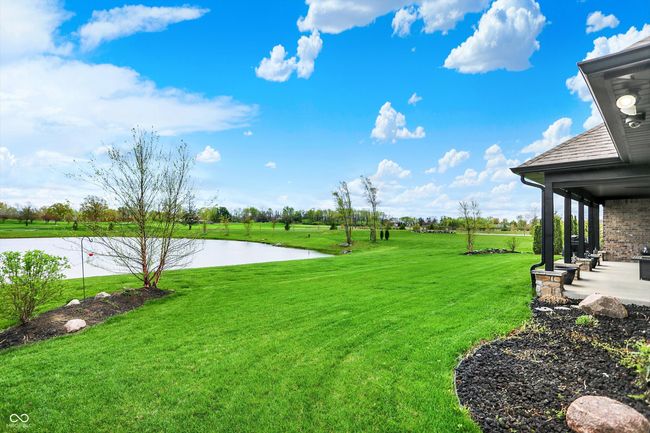 view of yard featuring a water view and a patio | Image 44