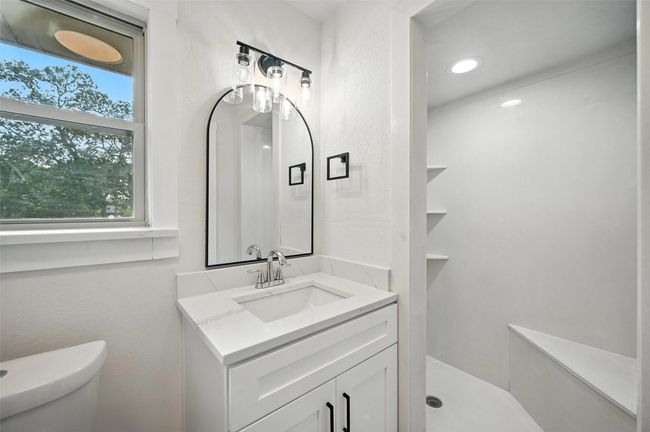 Full Bathroom located just a few steps from In Law Suite. | Image 13