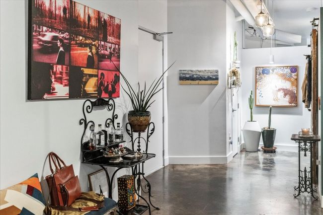 Corridor with concrete floors and baseboards | Image 16