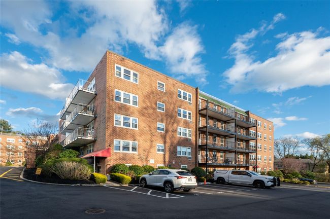 View of property with uncovered parking | Image 14