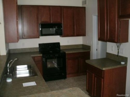 4103 Teal Ln, Walled Lake, MI, 48390-1410 | Card Image