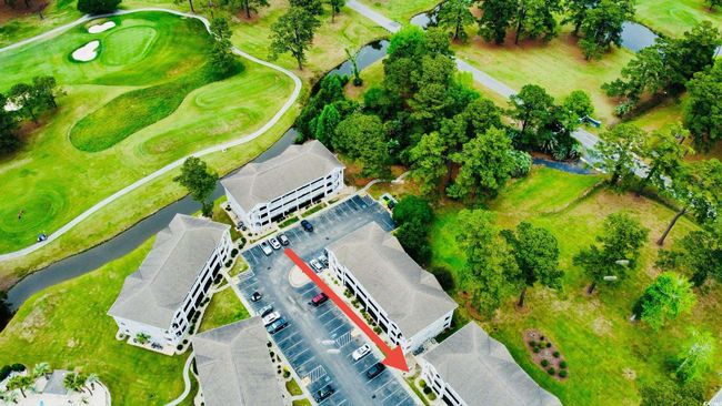 Aerial view of a golf club and a large body of water | Image 37