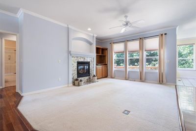 Living room with gas burning fireplace | Image 3