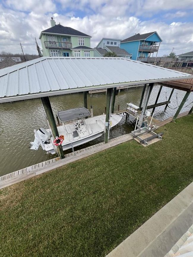 Aerial View of Covered Boat Dock, Boat Lift, Jet Ski Lift and Fish Cleaning Station | Image 47