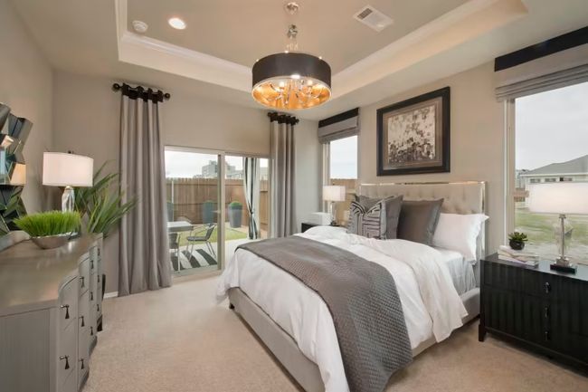 Photo of Pulte model home with same floor plan, not of actual home listed. | Image 8