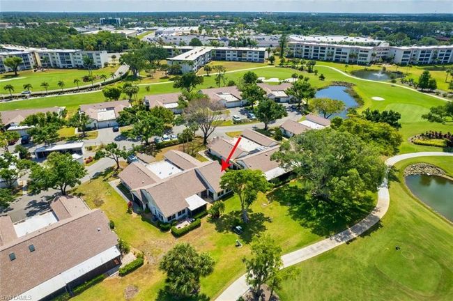 Birds eye view of property with golf course view and a water view | Image 4