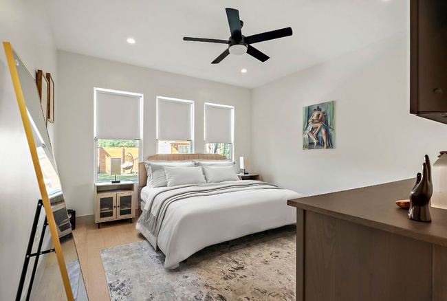 Bedroom featuring a ceiling fan, light wood finished floors, and recessed lighting | Image 16