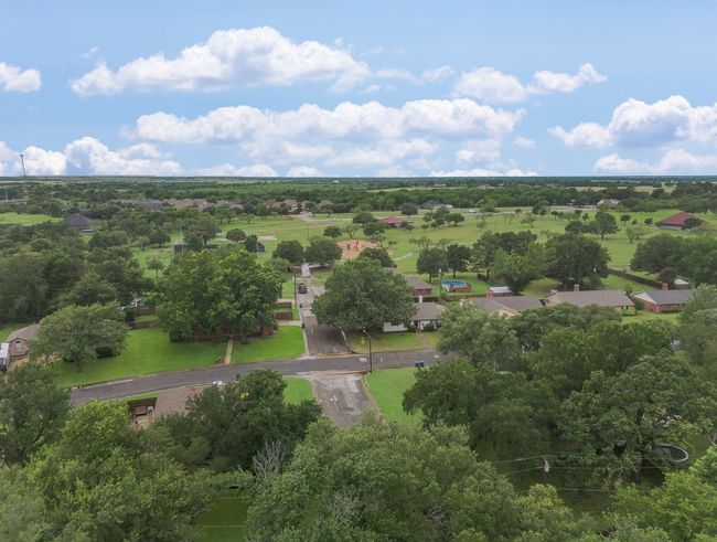 Aerial view of a tree filled landscape | Image 26
