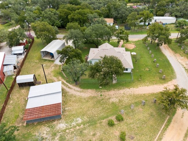 Bird's eye view with house, garage, storage shed and RV port | Image 4