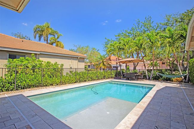 3848 Oak Ridge Cir, House other with 4 bedrooms, 3 bathrooms and null parking in Weston FL | Image 58