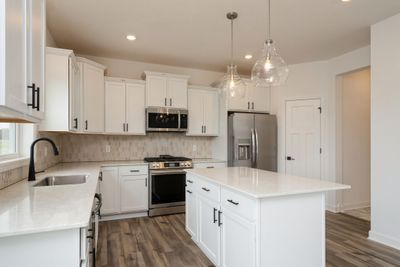 (*Photo of similar home, actual homes colors and finishes will vary) Bright, spacious and open. Your new kitchen is the ideal place for home cooks to create | Image 3